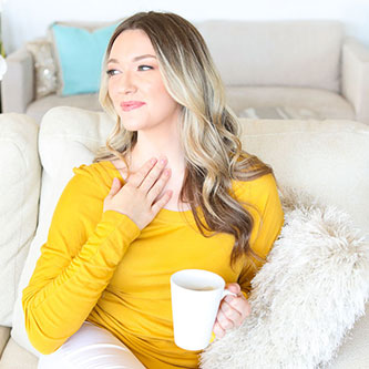A woman listening to a podcast.